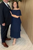 This dress was beautiful!  Hid all my flaws and was very flattering on. The material is beautiful. Wore it to a wedding and it was perfect!  Classy and elegant. - Nadia O.