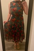I love that it doesn't have a zipper. It just slips on. It fits very well for a busty lady going to a family wedding and the length is perfect if you're short. But there's only one large button that doesn't fit either of the tiny button loops. It looks like this is probably just a one off mistake, but I'm sad I have to send it back :( - Eliza L.