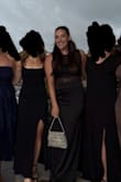Love love love! I had an early spring winery wedding, and the bride requested formal, floor length dresses. After looking at the venue, it was clear a black dress was the route to take, and this offered me a black dress, but not boring. The compliments, the fit, it was amazing. Will absolutely wear again. I didn't have to wear a bra, and I'm 34 DDD, also 6 months PP, and hid my shelf perfectly. 10/10, no notes babes. - Audrey W.