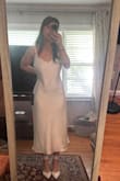 Fits a little big, so I'm going to have it altered. I'm cinching it with my hands in the pictures. So beautiful! - Claire Y.