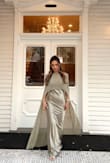 Absolutely loved this olive-green cape dress! I wore it as a wedding guest dress and received so many compliments all night long. The color was gorgeous. The fit was flattering. The cape detail made it feel so elegant and unique. It was comfortable to wear for hours and photographed beautifully. I would definitely recommend this dress for weddings or any special event! - Erica S.