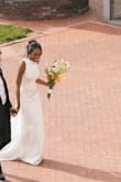 I got SOOOOOO many compliments on this gown. It was absolutely perfect for my civil wedding. The only change I would have made is to have gotten it taken in (I think I've lost weight since ordering it) and maybe hemmed just a little! Otherwise, it was perfect! - Taniya G.