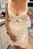This dress sits ridiculously low, barely covering the nipple. The rest fits well, so it's a debate of whether it's worth it to alter the straps or not. - Maggie S.