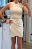 I like the look of this dress, but find the neck to be too tight. I tried to size-up but it was still too constrictive at the throat - Maggie S.