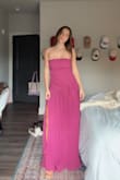 Honestly, it runs true to size. I am normally a xs/s in dresses, and the small fits great! I got a small & medium, and the medium is too big. I think it's stretchier than what the reviews say. It hugs me in the right places & the material is soft! I feel so pretty in this dress - Julie R.