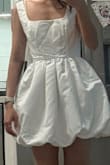 I really wanted to like this dress, but the fit was very strange and poorly designed. I ordered an extra small, and the top part was still super loose with way too much extra space, so it didn't fit well at all. The overall shape just looked awkward on. Also, the dress was way too short for me, and I'm only somewhat tall. The proportions and fit just felt off. Unfortunately, this dress did not flatter my body at all. - Jennifer C.