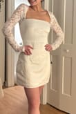 Bought for my winter rehearsal dinner, but ended up returning. It's really cute, but the sleeves just fit a little weird, especially where they meet the dress. The bodice fits well, but the fabric looks a little cheap in bright lighting. - Leah M.