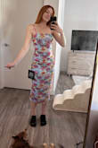 I feel so sexy in this dress! I will say the top is a little big for me, as I have smaller boobs. But nothing a strapless push up bra can't fix!
I wouldn't size down as I feel it would be too tight/hard to walk. Not a lot of give around the knees. - Danielle M.