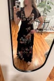 Just a heads up - this dress is much heavier and not as lightweight as it appears. The slit is also deceptive as it's in the middle of the dress and not high on the side like the model is advertising. The navy color is much darker than the image as well. Nothing close to the blue tone you see in the photo. - Christine D.