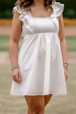 I absolutely loved this dress! I got it for my college graduation pictures and ceremony. I bought a few options but returned all the others when I tried this one on. I wouldn't say my chest is large, but I know it also isn't small. However, the tie in the back was slightly awkward about keeping everything in place so I would suggest wearing body contour tape to hold everything up. - Campbell P.
