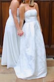I wore this for my sorority formal and loved it! I ended up buying it in a pinch because I don't normally wear strapless dresses, but it turned out so adorable! The dress was long on me, but that was expected as I am a short girl and had no time to hem it. Loved!! - Eleanor B.