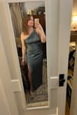 Gorgeous dress. Will look fantastic when I iron it. It hides the belly well. - Kathleen O.