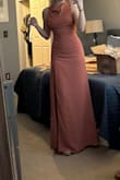 The dress is so cute! However, there is no stretch. It's tight but it fits. If you are in between sizes, then go up. - Ellie F.