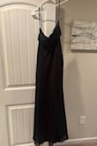 Dress ran bigger than I hoped. The material was thin and felt cheap. - Lori B.