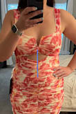This dress is super cute and comfy. Very stretchy. I hover between a medium and large and the large was a bit too big on the straps. The straps are not adjustable. However the main issue was the triangle cut out piece was not sewn correctly. One side was much wider than than the other and it made the dress look poorly made. - Heather K.