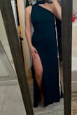 This dress is super comfortable and has a bit of a stretch to it which makes it easy to take on and off! - Carolynn F.