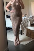 It'd be nice if it matched colors to the picture but it's brown and actually reflects like a silver taupe color. I thought it would be more gold/beige. Also is much shorter than expected - Madison P.