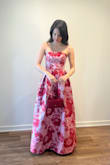 Loved the fabric, not too thin! The back laces up to give a little extra room. I had it as tight as it would go. Probably could have made an XS work, but they were out of that size when I ordered. Pockets are a nice bonus! I'm wearing 4 inch heels in this picture, and it was perfect without needing any alterations. - Rach L.