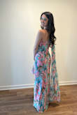 Beautiful pattern and loved the attached scarf piece for an added flair. Fabric is a nice weight and lined. Ran true to size! Wearing 4 inch heels in the picture. - Rach L.
