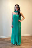 It gives zero dimension and not overly flattering in my opinion. Usually wear a small and ordered this in XS and it fits. I think small would have been too loose, pulling on it all night. Really pretty color though!
Wearing 4 inch heels in picture, and I'm 5'7 for reference. - Rach L.