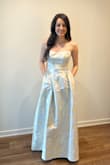 In pictures, everyone thought it was white, so it wouldn't have worked as a wedding guest dress. The belt is way too big for the waist size. The waist fit perfectly, but belt hung low. Would need to have that stitched to size for it to work. Pretty gown and fabric was nice! Wearing 4" heels and I'm 5'7 tall. - Rach L.