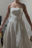 I really liked this dress. I found the top part flattering. It was a tiny bit loose on the waste. I ordered as an option for my catholic ceremony, but wasn't exactly what I wanted. For a lower stakes event I'd have kept it. - Rachel J.