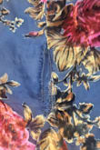 I want to start off by saying the silhouette of the dress is lovely and the fabric/print is beautiful, BUT the outer shell ripped as soon as I tried it on.

I'm usually a medium but I sized up to a large. The large fit beautifully. Everything was great until I noticed separation of the seams after just trying it on.

I ordered this for a last minute invitation to a gala and had nothing else to wear. I reinforced the seams on my own, and those are the only places the fabric didn't rip.

I got a shawl to hide the rips in the bodice. I was constantly covering myself it to hide them. It was such a bummer. I really wish it would have been a functional dress. - Tricia C.
