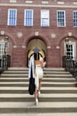This dress was perfection for my daughter's college graduation photo shoot! The material was thicker and very good quality, plus there was the added benefit of a full liner. We realized that the back ties were much better in a simple knot vs a bow. The bow would loosen up repeatedly, and ended up looking messy compared to keeping the ties in the simple knot. The knot also helped to keep the sheer side panels perfectly taut and in place without having to tighten and re-tie them every few minutes.
My daughter is broad-shouldered and athletic build, so the dress did run on the shorter side on her frame. Her shoes were also from Lulus (ivory satin pump sandals). - Cori M.