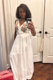 I really like this dress! It is short girl friendly. I don't have to get it hemmed. I do have to wear heels. It hits perfectly with the heels on. I saw in reviews that the waist is loose, which also prompted me to purchase. My menopausal mom pooch makes me look perpetually three months pregnant. The dress had plenty of room in the waist. If you are younger, and leaner keep that in mind and size down. I am also a D cup but had to wear my push-up sticky bra. The bust area was loose. Maybe if I had a longer torso it would be different. I was actually happy that it could accommodate my boobs and my mom tummy. The fit reminded me of Ann Taylor clothing. A small isn't really that small. - Martazsh H.