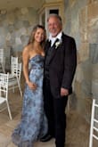 I sized up courtesy of the other reviews (thanks, girls!) and was happy I did. I got a medium (I'm about a size 4), and it was nice and tight in the corseted bodice and flowy in the skirt. Loved it and felt beautiful. Ps. That's my dad in the pic, not my date ;)
Tip: get the double sticky-sided bras. Everything stayed perfectly in place. - Alyssa G.