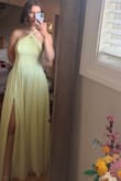This dress is pretty, but I ended up going a different direction. I'm pretty consistently a size medium, and this dress felt too big, so I would definitely size down. - Violet W.