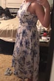 I got this for my upcoming bridal shower. I have a chubby apple shape, and this dress  is flattering. And it's WHITE, which is every size 8/10's nightmare.

It does run tight.  I happened to be wise enough to order both a medium and a large -- based off of the reviews I read -- even though I am always a medium on this site.  I'm keeping the large, although I could have made do in the medium. I just wouldn't be able to eat cake at the shower! Haha.

The top is a little loose -- made for larger-busted women than I. I'm going to try to take it in myself, so I'm going to keep it.  (I wear a 34D but it's more my broad shoulders than my actual breast size).  

Everyone who has seen it so far loves it! - Jenna B.