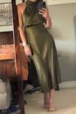 This is a gorgeous dress! My only complaint is it is tough to get the wrinkles out, but it's worth it! Get quality and fit. - Carinne M.