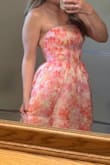 I went to a bridal shower in this dress it was very cute. I liked the tie back. Did not have to worry about it sliding down. - Hannah L.