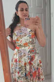 It runs a smidge large.. I had so much space once the dress was zipped up.  Debated keeping it several times but will return it. Looks really pretty otherwise. Its got a nice A line and all! - Tithi M.