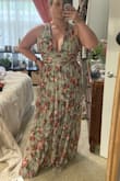 I really like the way this fits. I'm typically an XXL in Lulus dresses but the XL fit me in this dress. My bust measurement is about 44" for reference. The deep plunge with wide straps over the shoulders is very flattering and supportive enough for these heavy girls. I do think I'll probably need boob tape just for a little extra security. Wouldn't want to have a wardrobe malfunction. Overall, I really love this dress. It was quite long on my 5'4 frame so I'll definitely have to get it hemmed. Happy with the purchase. Excited to wear it to my friend's wedding! - Emily B.