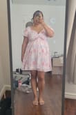 I bought this dress to have a cute summer dress. It is the perfect length for this short girly pop. I also have a soft belly and this dress is perfect for my current figure. I highly recommend this dress. It can't be worn out with cute sneakers or with strappy sandals. You can wear with the sleeves on or off your shoulders. I have a larger bust and I prefer the sleeves up. - Krisell C.