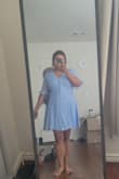 I bought this dress to have more cute sun dresses for the summer. I have a soft belly and it is perfectly hides it while also giving me a nice silhouette. I have a larger bust and I was worried my boobs might be smashed or make a gap in my buttons. The dress actually has an extra hidden button to hide the gap! I wore this dress out on a Duffy boat ride and felt so summery. - Krisell C.
