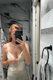 The bust fits very strangely. I'm 110 lbs, 5'5", and a 32C, sometimes I'm a 32D. The bust was baggy and big, but everything else fit great. It was also extremely low cut. - Margaret M.