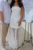 This dress was perfect for my wedding shower, and I got so many compliments. The wiring at the top didn't bother me and actually helped it stay up/laying correctly. It was super long, though, and the waist was too big. I had to get it hemmed and taken in - AnnMarie Y.