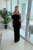 This dress was a hit! I wanted something simple but fun. It was also super easy to travel with it in my carry-on. I ordered a medium and a large, and so glad I did. The medium was extremely tight around my 36D chest. I ended up with the large. It could've been slightly tighter, but overall it was perfection! - Isel A.