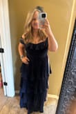 This dress is beautiful! Super flattering! I will need to get it hemmed just an inch. It's not terribly long, but just to be safe, I don't want it dragging on the ground. I love the arm coverage. I won't have to pull it up all night, either, because it has a sticky lining at the top. The bust fits perfectly. I am a 38DD. - Lindsey B.