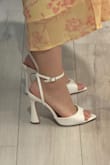Returned only because it felt a bit high for the amount of walking I needed to do. The strap connects to the heel part and was too big (and gaped like in the pic) when I made it fit my ankle. If I ended up keeping it, I probably would've just punched more holes in the strap. PSA that this isn't a Lulus brand shoe but an external brand's. Seems to be cheaper/same price on here though! - JY L.
