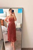 Ordered this dress for a few summer weddings, and it is perfect! Originally ordered an extra small since I'm usually in between sizes, but typically opt to size down. The zipper was a little hard to zip up, regardless, and with it being a smaller size, I needed to exchange it for a small. The new size fits perfectly, and I'm happy with how flattering it is! - Winona M.