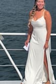 This white cowl neck gown was absolutely perfect for my wedding day! The fit was flawless. It hugged my body beautifully without needing constant adjustments. It was so comfortable to wear throughout the entire day and night. The cowl neckline added such an elegant and timeless touch, making the dress look classy and sophisticated. The material felt soft, luxurious, and high-quality, with just the right amount of flow and structure. I did make one change and that was to add in a bustle because there is a small train on this. I received endless compliments and truly felt beautiful wearing it. If you're looking for a stunning gown that fits perfectly and photographs beautifully, I highly recommend this dress! - Jenn M.