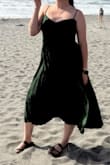 Wore this to a wedding in the Redwood forest & it went perfectly with the venue and theme (Pics are from the beach nearby). Got so many compliments. The green is truly emerald & material was not see through, which I was a little worried about. I got an XL bc I was tight on time & wouldn't be able to return, but definitely could've worn my true size (L). - Lindsey G.