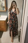 I just received my dress and I'm in love! I'm glad I read the reviews who said the dress runs a little big because the small fits perfectly. I'm tall and it's hard to find long dresses that hit below my ankles, this dress almost grazes the floor. Also, this is a quality dress! It feels and looks expensive. The gold accents on the dress are just the cherry on top! - Kathlene K.