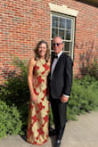 My husband and I were attending a black-tie wedding, and I wanted a long dress that would be form-fitting and classy but without being too sexy. It also had to be comfortable because we love to dance. This dress totally fit the bill. There are two layers to this dress. The lining or "slip" is a soft 100% cotton, very breathable and comfy; while the shell or outer dress is a beautifully woven gold metallic and rust poly sheath. It reminded me of a traditional Indian saree. I got so many compliments, it was almost embarrassing. If they knew the modest price tag, it would have gotten even bigger raves. A couple of things to note: 1) I'm 5'5" & wore 1.5" heels. I hemmed the shell (gold/rust overlay) up about 2-3 inches, basically made it even with the lining. Since the lining & shell are two separate pieces, that could have been tricky. 2) Luckily, the halter top was perfect for my bust; however, if you are bigger up top, this might not be the dress for you (i.e., you could have side-boob exposure) - Brigid G.