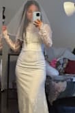 I absolutely loved it. It is really well made. It was long on me, but it's because I'm short. The lace design is gorgeous. - Erendira R.