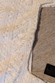 I agree with others that this is poorly made. The fabric pattern is not aligned properly at all. Along the neckline/bustline seam, the lace was sewn together very crookedly. On one end, only a small portion of the pattern line is visible, but it gradually angles so dramatically that on the other end the entire pattern line is visible. The misalignment is very noticeable and makes the garment look poorly constructed. I also found that it was tight in the bust but loose around the bottom of the crop top. Not well made at all. - Mary N.